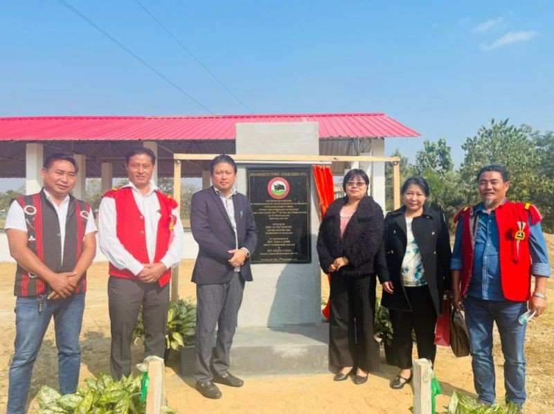Minister Jacob with DC Niuland and others after inaugurating the urban station and marketing shed at Khaghaboto on December 15.